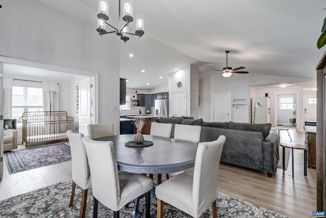 147 Langley Dr, Waynesboro, VA 22980 - dining space with light wood-style flooring, ceiling fan with notable chandelier, and a wealth of natural light