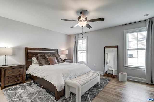 147 Langley Dr, Waynesboro, VA 22980 - bedroom featuring baseboards, ceiling fan, wood finished floors, and visible vents