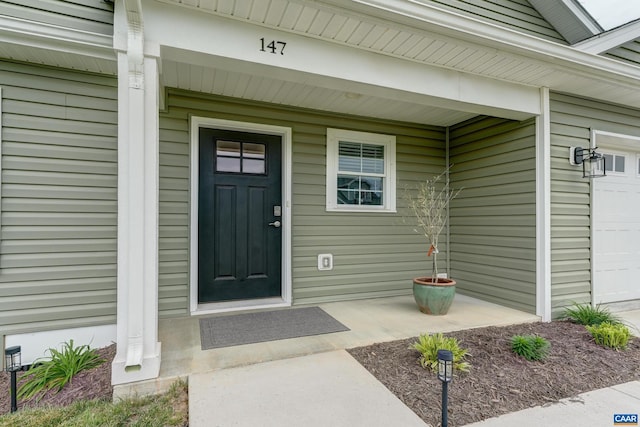 147 Langley Dr, Waynesboro, VA 22980 - property entrance with a garage and covered porch