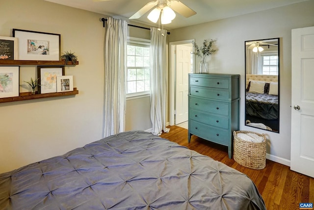 209 Old Lynchburg Rd, Charlottesville, VA 22903 - bedroom with baseboards, ceiling fan, wood finished floors, and multiple windows