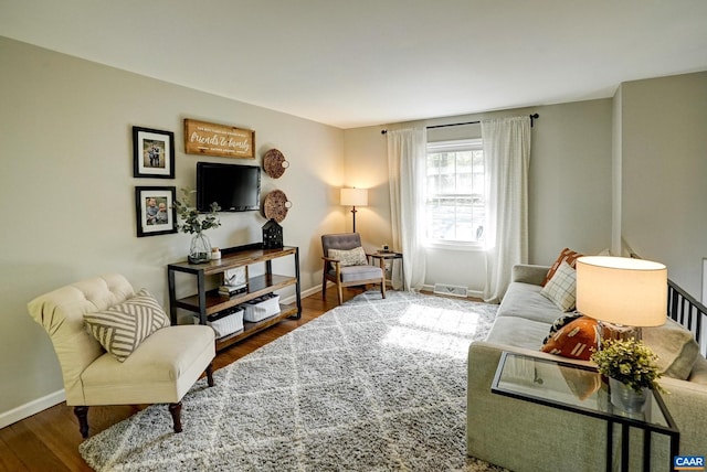 209 Old Lynchburg Rd, Charlottesville, VA 22903 - living room featuring baseboards, wood finished floors, and visible vents