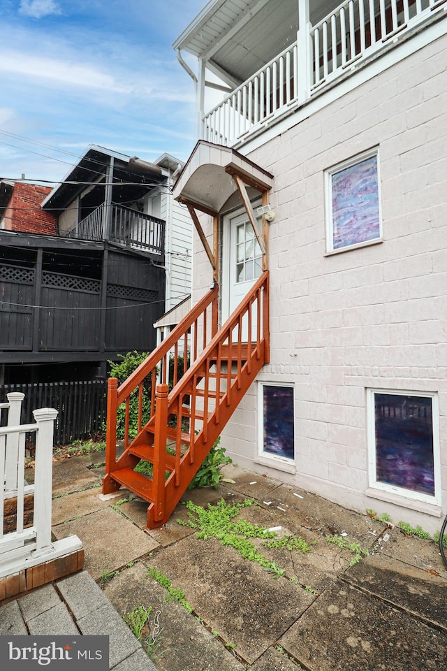 exterior space with a balcony