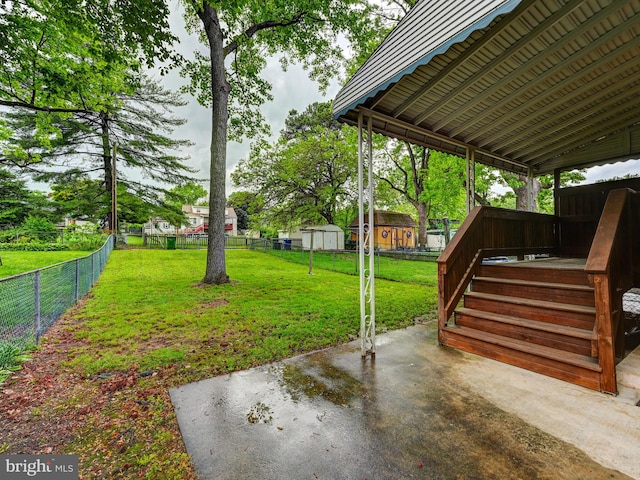 7612 Daniels Ave, Baltimore, MD 21234 - view of yard with a patio area, a storage shed, and an outdoor structure