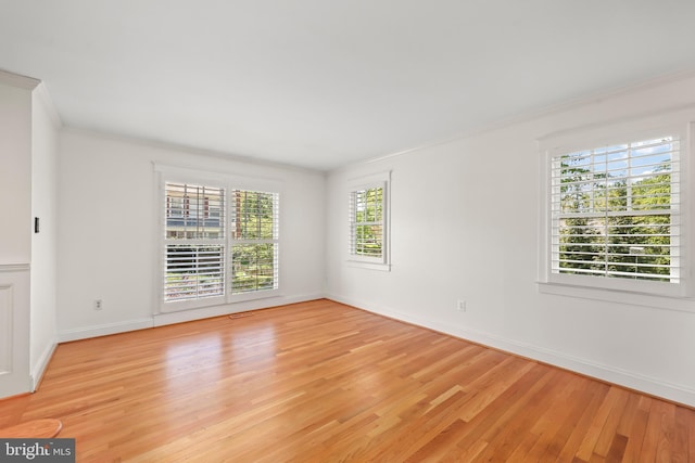 9373 Robnel Pl, Vienna, VA 22182 - empty room with crown molding, light wood finished floors, and baseboards