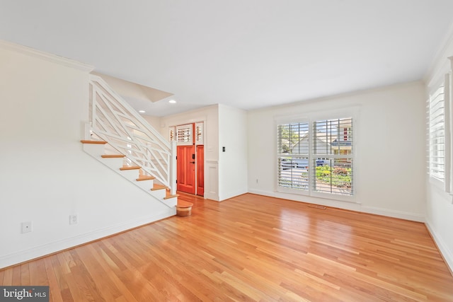 9373 Robnel Pl, Vienna, VA 22182 - unfurnished living room with baseboards, recessed lighting, wood finished floors, and stairway