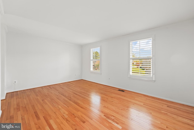 9373 Robnel Pl, Vienna, VA 22182 - unfurnished room featuring baseboards, light wood finished floors, and visible vents