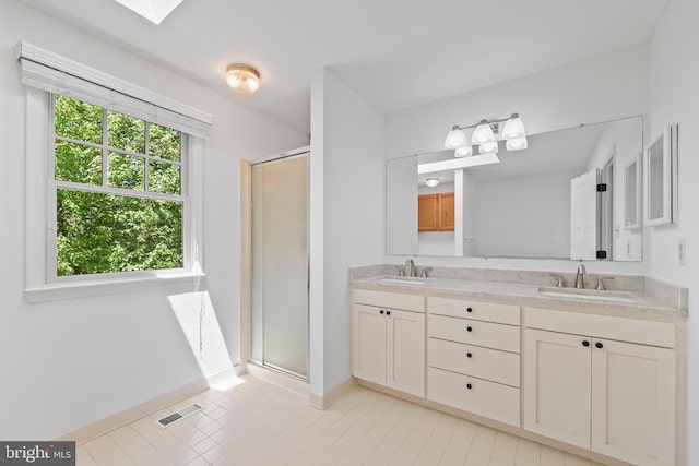 9373 Robnel Pl, Vienna, VA 22182 - full bath featuring baseboards, visible vents, a sink, and a stall shower