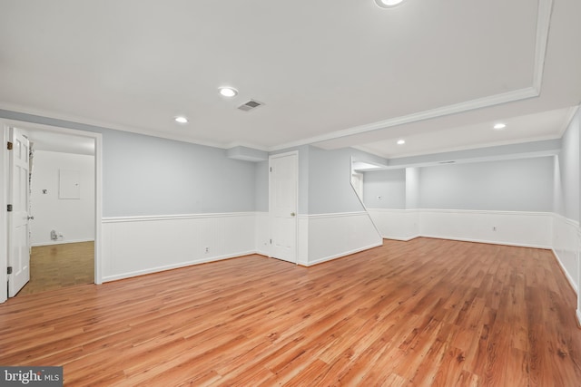 9373 Robnel Pl, Vienna, VA 22182 - finished below grade area with visible vents, recessed lighting, light wood finished floors, and a wainscoted wall