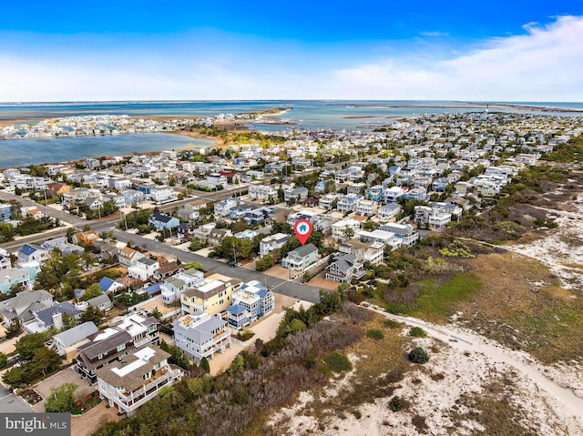 aerial view featuring a residential view and a water view