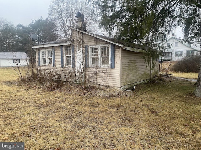 144 Mechanic St E, Muncy, PA 17756 - view of property exterior featuring a chimney