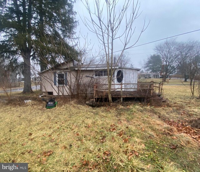 144 Mechanic St E, Muncy, PA 17756 - rear view of house with a wooden deck