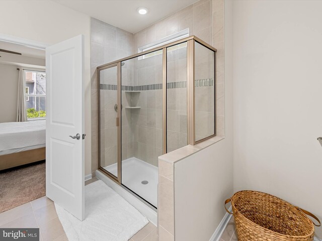 37268 Brenda Ln, Frankford, DE 19945 - full bath with baseboards, tile patterned flooring, a stall shower, and connected bathroom