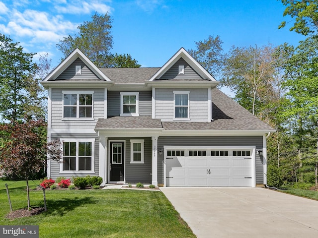 37268 Brenda Ln, Frankford, DE 19945 - view of front facade featuring a shingled roof, concrete driveway, and a front lawn