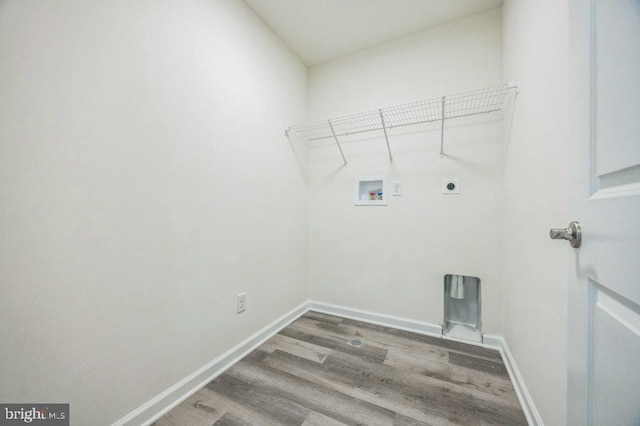 laundry area with washer hookup, laundry area, electric dryer hookup, baseboards, and wood finished floors