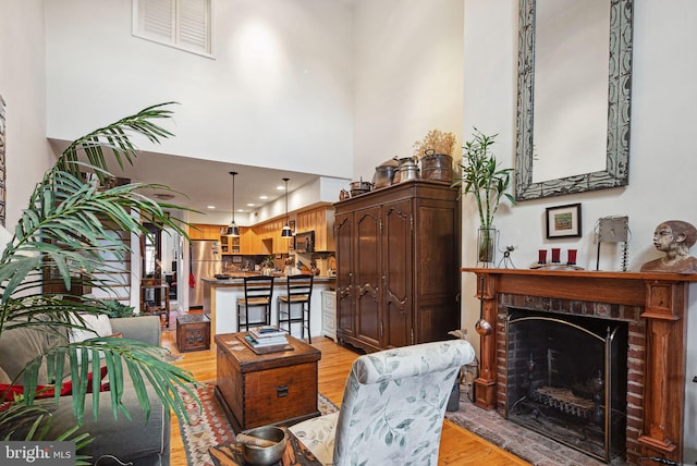 400 S 2nd St Unit 408B, Philadelphia, PA 19147 - living room with a fireplace, recessed lighting, visible vents, and light wood-type flooring