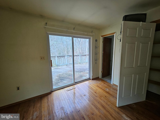397 Charles Hall Dr, Millersville, MD 21108 - spare room with baseboards and hardwood / wood-style flooring