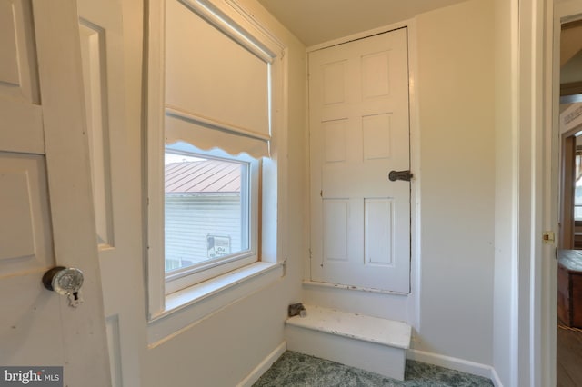 bathroom with baseboards