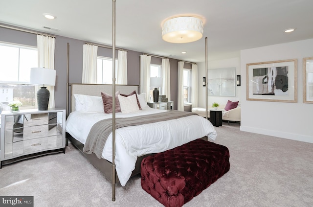bedroom featuring baseboards, visible vents, and carpet floors