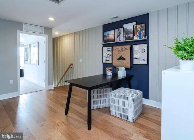 home office featuring wood-type flooring, recessed lighting, visible vents, and baseboards