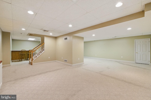 interior space featuring stairway, carpet floors, recessed lighting, and visible vents