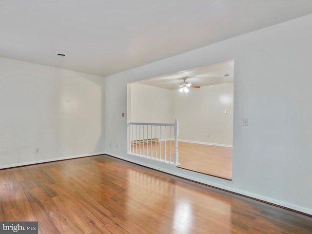 321 Valley View Dr, Waynesboro, PA 17268 - empty room with wood finished floors, a ceiling fan, and baseboards