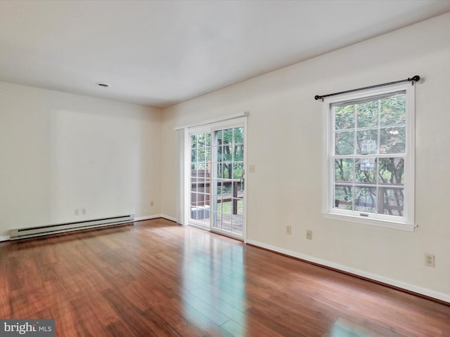 321 Valley View Dr, Waynesboro, PA 17268 - empty room featuring a baseboard radiator, wood finished floors, and baseboards