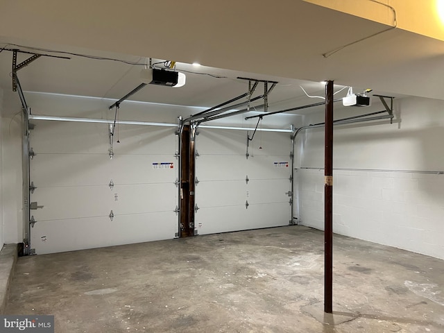 2909 Golden Fleece Dr, Pasadena, MD 21122 - garage featuring a garage door opener