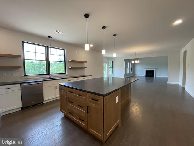 kitchen with dishwasher, dark countertops, open shelves, and visible vents
