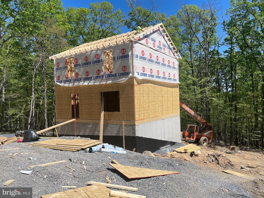 view of side of property with brick siding