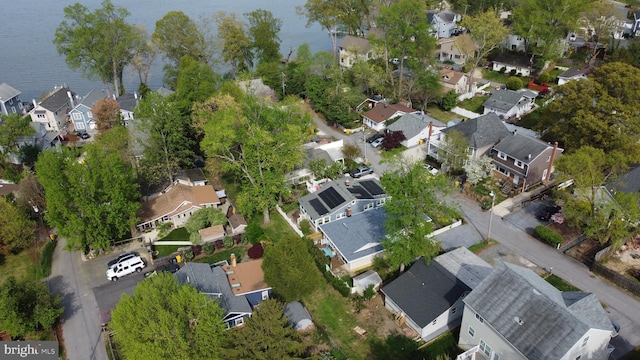aerial view featuring a residential view and a water view