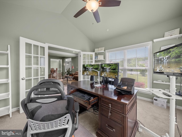 office with a ceiling fan, carpet floors, high vaulted ceiling, and baseboards
