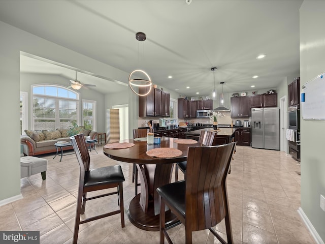 dining space with light tile patterned flooring, recessed lighting, ceiling fan, and baseboards