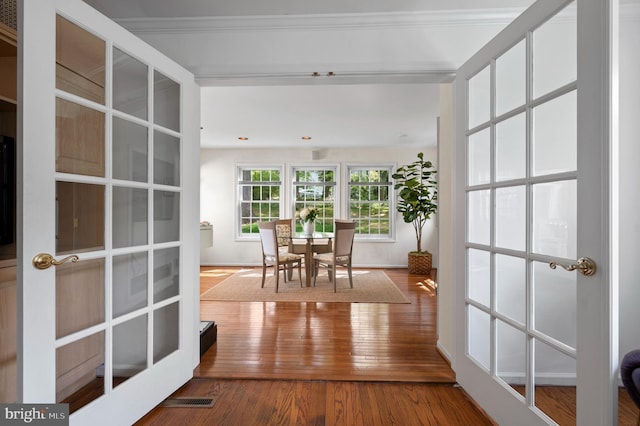 interior space with french doors and visible vents