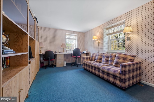 home office featuring carpet and wallpapered walls