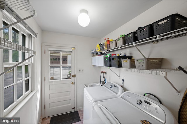 laundry room with separate washer and dryer and laundry area