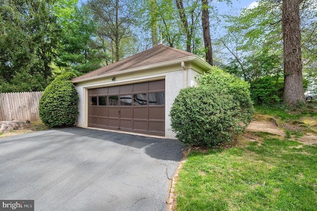 garage featuring fence