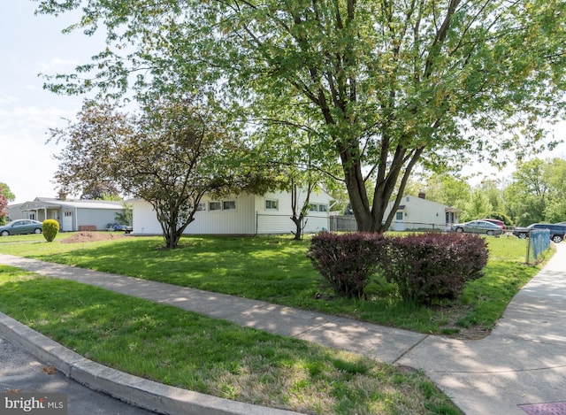 2 Edgewood Ln, Levittown, PA 19054 - obstructed view of property with fence and a front lawn
