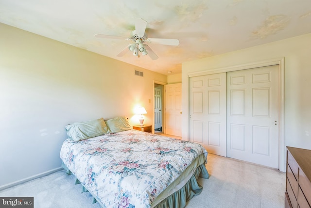 2707 E Crossing Cir, Norristown, PA 19403 - bedroom with light colored carpet, a closet, ceiling fan, and baseboards