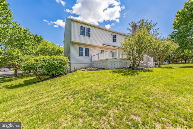 2707 E Crossing Cir, Norristown, PA 19403 - back of house featuring a lawn and a chimney