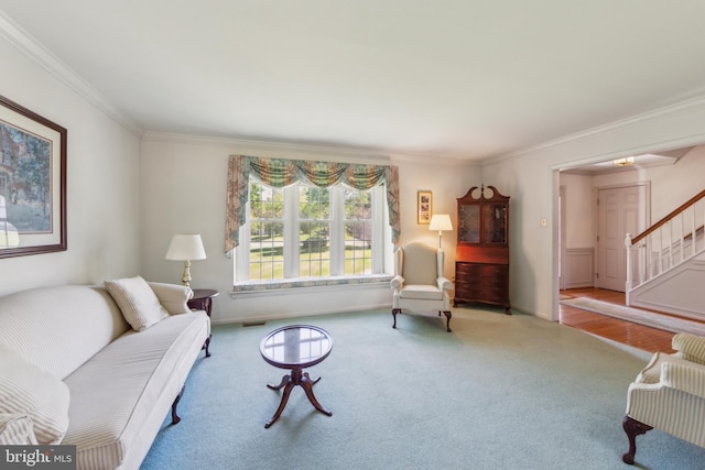 2707 E Crossing Cir, Norristown, PA 19403 - carpeted living room featuring crown molding, stairs, and baseboards