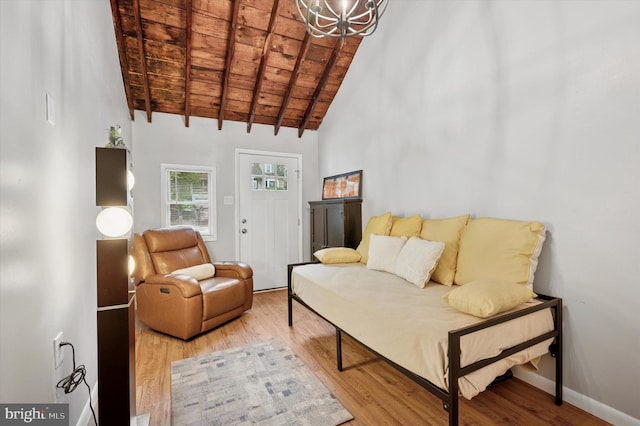 628 Edge Hill Rd, Glenside, PA 19038 - living area featuring wood ceiling, a chandelier, wood finished floors, beamed ceiling, and baseboards