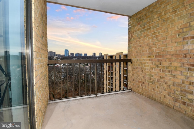 4500 S Four Mile Run Dr Unit 1218, Arlington, VA 22204 - balcony at dusk featuring a view of city