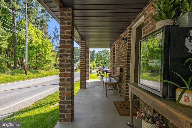 view of patio featuring covered porch