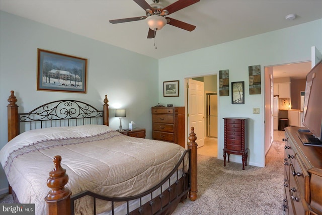 bedroom featuring ceiling fan and light carpet