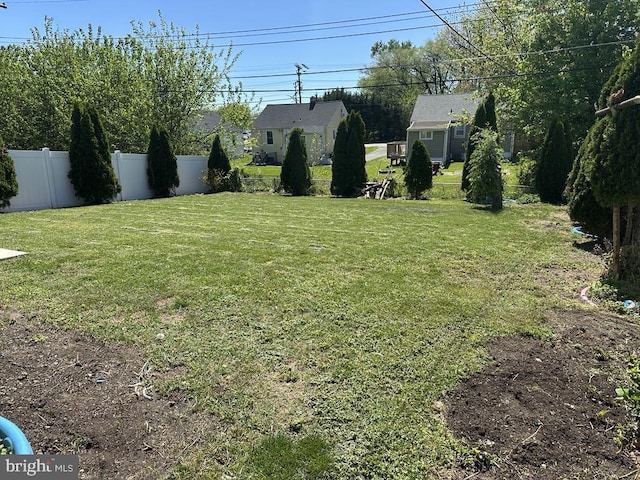 view of yard featuring fence