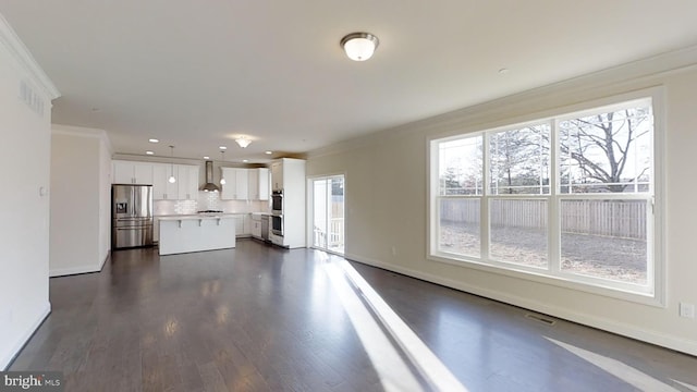 1094 Linden Tree Dr, Taft Model, Annapolis, MD 21409 - unfurnished living room featuring crown molding, dark wood-style flooring, and recessed lighting