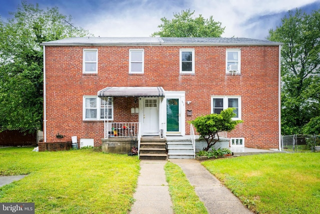 view of front of home with brick siding