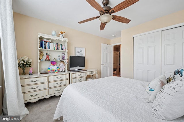 bedroom featuring a closet, a ceiling fan, and carpet floors