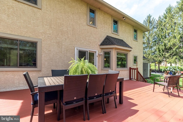 deck featuring outdoor dining space