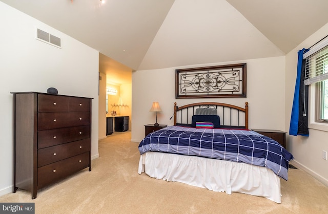 bedroom with carpet flooring, baseboards, visible vents, and vaulted ceiling